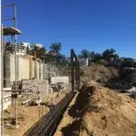 Hillside construction in the Hollywood Hills including retaining walls construction and caisson drilling